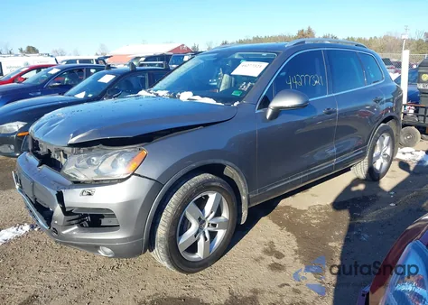 2012 Volkswagen Touareg Vr6 Lux z USA, uszkodzony, nr VIN WVGFF9BP0CD002184